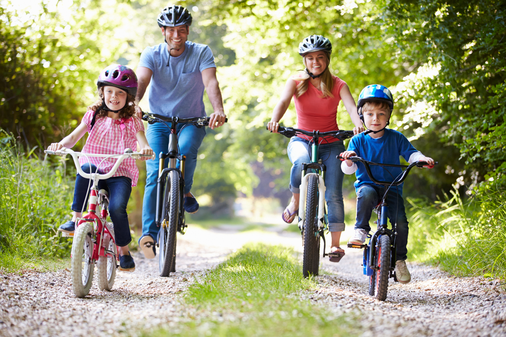 Image of a family going cycling, illustrating there are lots of outdoor activities in Radlett.